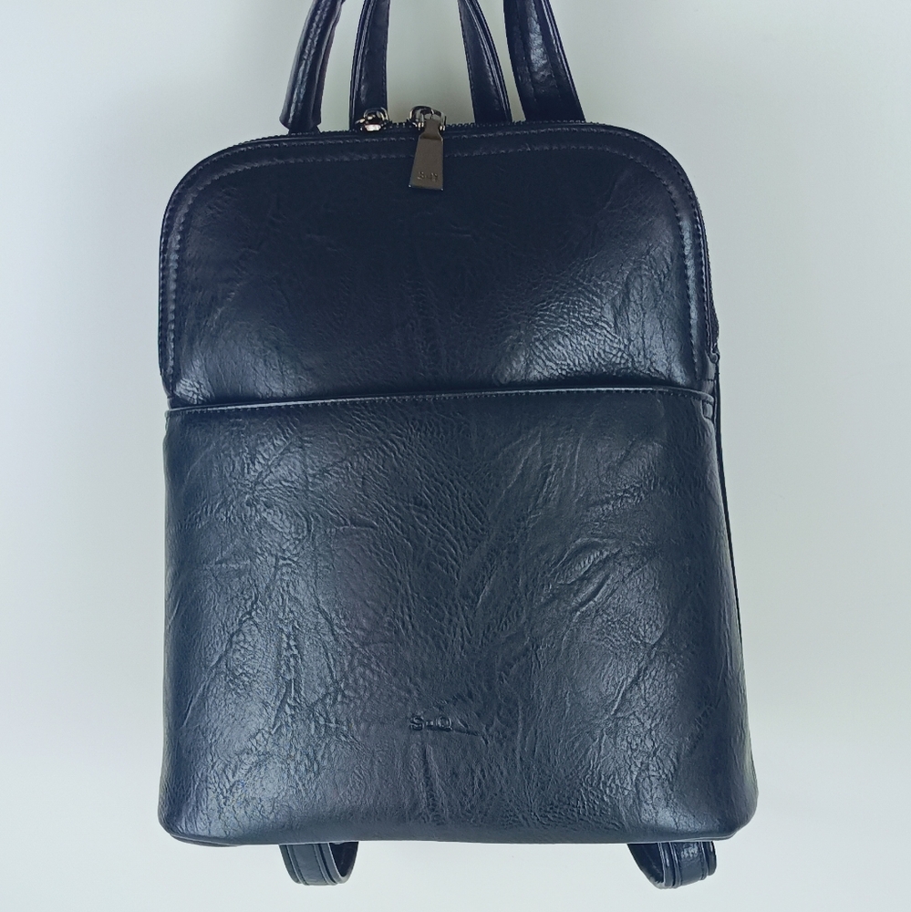 S.Q Maggie  convertible backpack black in color.